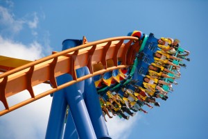 How do roller coasters roll